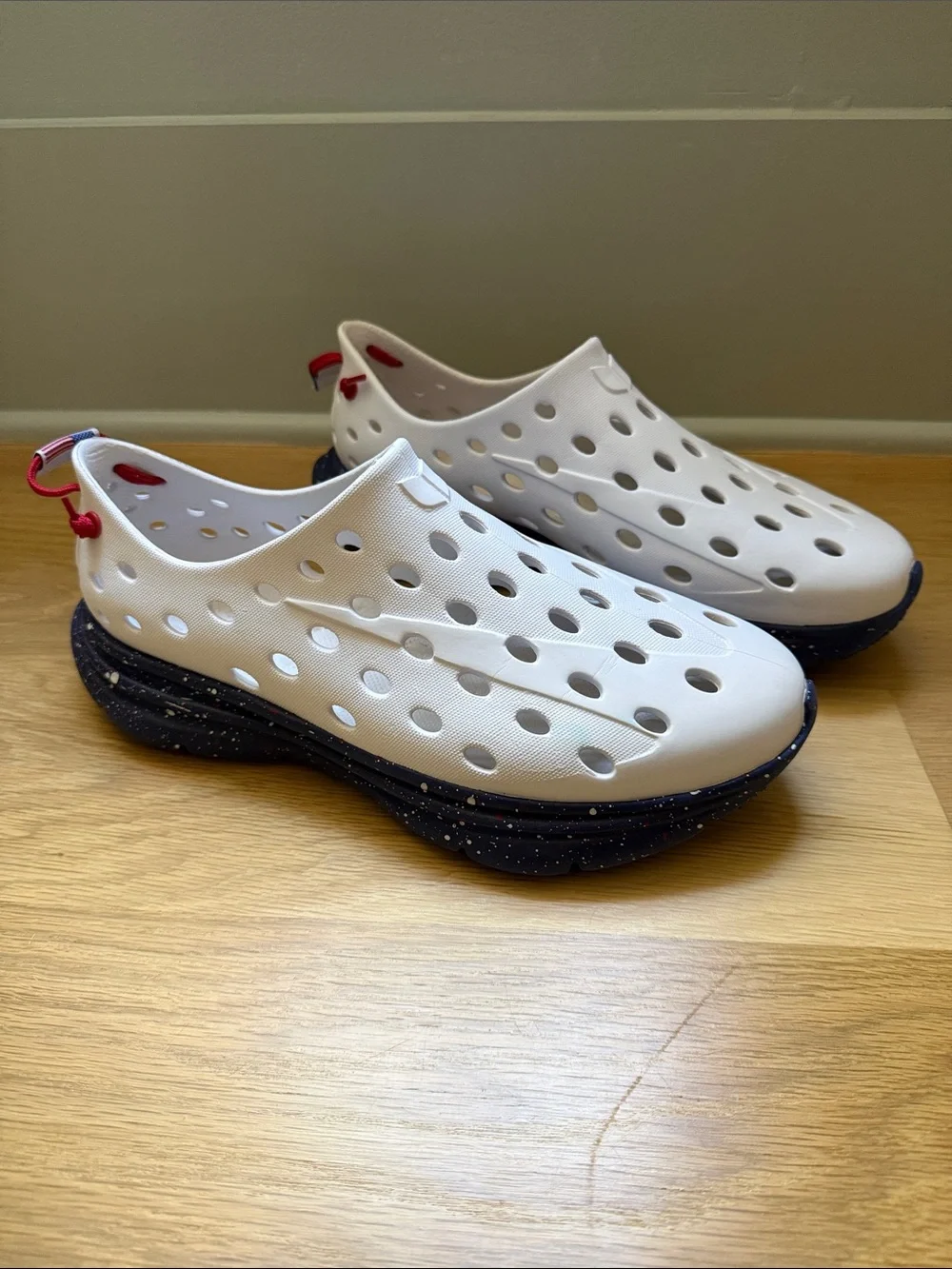 Men’s Kane shoes white with blue bottom and white and red speckles
